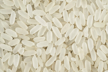White rice texture background. Heap of white rice background. Macro shot rice texture pattern