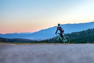 Plexiglas foto achterwand Women cycling on the mountain road   © Daniel Vincek