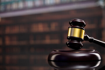 Law theme. Court library - gavel of the judge and books.