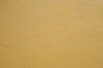 Yellow cement wall.