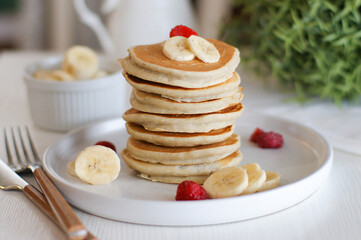 Banana pancakes with berries.