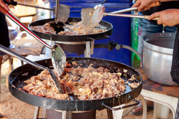 Crisp fried mussel pancakes or Mussel omelette in big pan, Thailand call Hoi Tod.