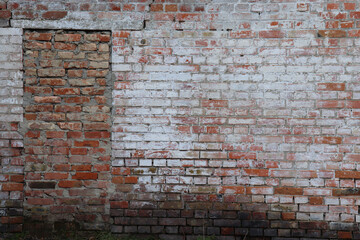 Blocked up a doorway or entryway in a red and white brick wall. Bricked up door. No exit. Old brick wall background. 	
