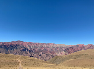 Fototapeta na wymiar Mountain colors. Panoramic view of Rainbow Mountain. Travel and wanderlust concept 