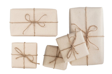 Isolated eco friendly packaging gifts in kraft paper on a white background. Gift boxes wrapped. Top view. Flat lay