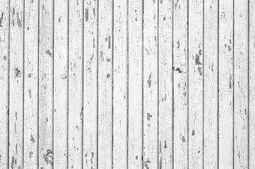 Pale gray white wood planks texture or background. Old shabby flaky wooden boards