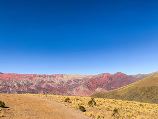 Mountain colors. Panoramic view of Rainbow Mountain. Travel and wanderlust concept 