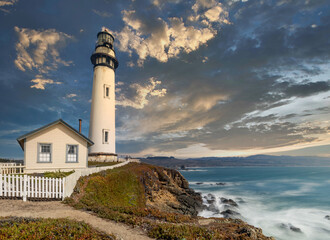 Pigeon Point lighthouse against the backdrop of a beautiful sky and ocean with waves, a great...