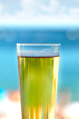 Beer glass at the beach
