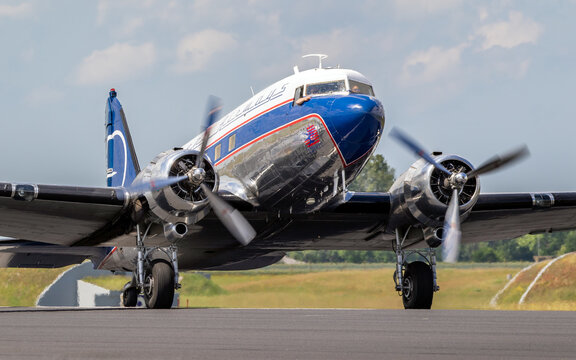 Douglas DC-3 Dakota vintage transport plane taxiing to the runway