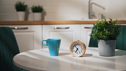 The clock shows seven in the morning.