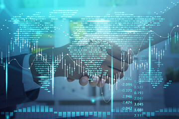 Business people handshake, world map and graph changes