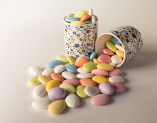 Many almonds inside of porcelain cups: easter passover with floral pattern, at kitchen