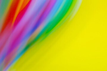 Yellow background with multicolored wavy stripes