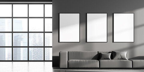 Cosy living room interior with three empty white poster