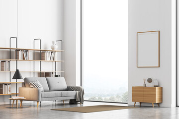 Corner view of bright living room interior with poster