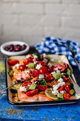 Greek baked salmon with greek salad .style rustic