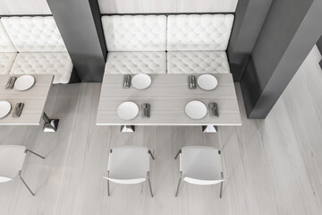Top view of wooden cafe interior with table and seats, public restaurant