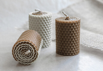 Handmade decorative wax candles with honey aroma. Decorations for the interior.