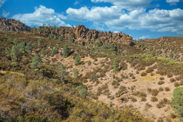 Fototapeta na wymiar Rock formations in Pinnacles National Park in California, the destroyed remains of an extinct volcano on the San Andreas Fault. Beautiful landscapes