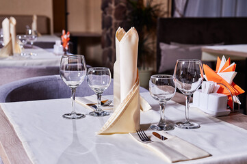 Cafe or restaurant interior and table settings