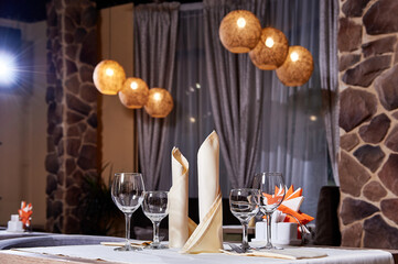 Cafe or restaurant interior and table settings