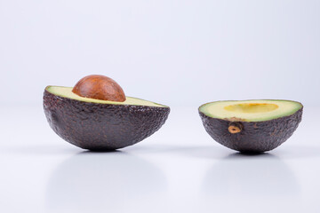 Avocado cut in half. Healthy organic food.