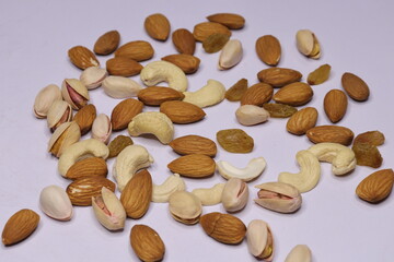 Silver Tray with mixed dried fruits on white Background
