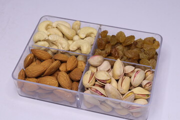Silver Tray with mixed dried fruits on white Background