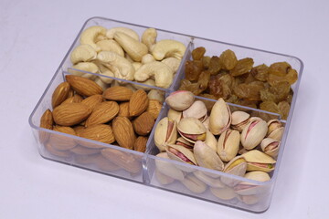 Silver Tray with mixed dried fruits on white Background
