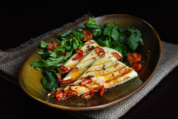 Grilled Halloumi Cheese, Fried Chile Pepper With Garlic And Mix Salad