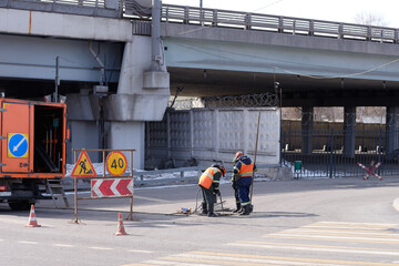City sewer workers, emergency vehicle