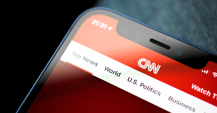 Kharkov, Ukraine - March 17, 2021: Homepage of cnn news app on the screen, banner with logo of media company