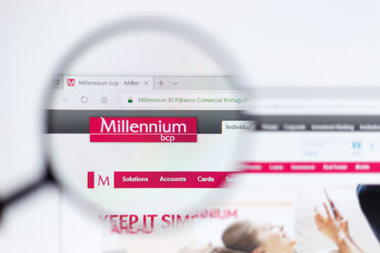 Moscow / Russia - 04.08.2019:  Banco Comercial Portugues logo on the official website homepage. Banco Comercial Portugues logo visible on monitor screen through a magnifying glass