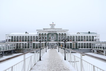 Historical river landing stage on the Bank of the Volga river, where the Ostrovsky pier hotel is...
