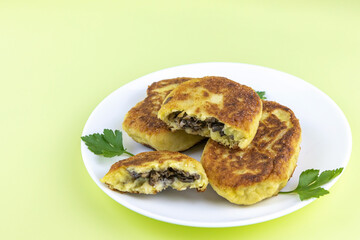 fried lean potato pies with mushroom filling