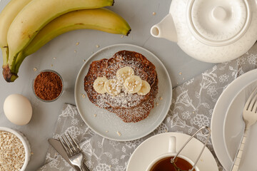 Tasty banana pancakes with ingredients