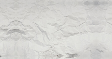 A crumpled blank sheet of paper. On a white background. Dented