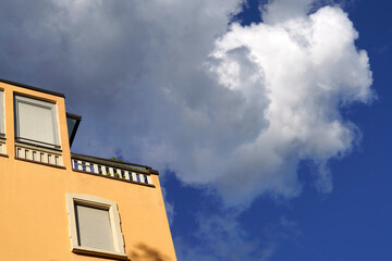 Buildings of Milan with a storm coming