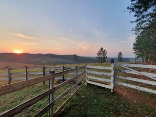 Fototapeta premium fence on the mountains at sunset