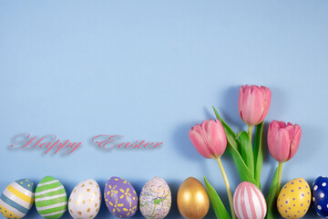 Fototapeta na wymiar Pink tulips flowers and colourful eggs on pink background. Card for Happy Easter. Waiting for spring. Greeting card. Hello spring and easter concept. fresh tulips. Flat lay, top view, Copy space