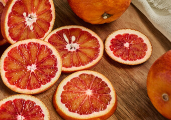 Red juicy orange sliced in rounds, close up