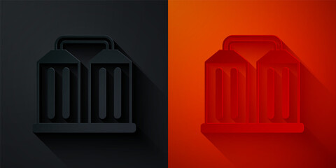 Paper cut Granary icon isolated on black and red background. Silo with grain, elevator, granary, factory. Warehouse of grain crops. Paper art style. Vector