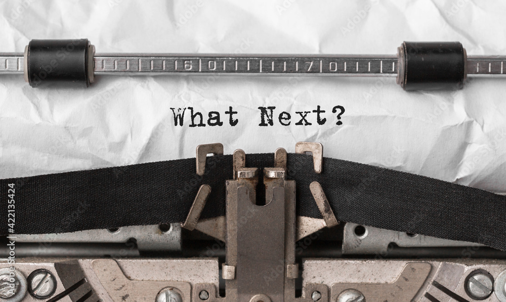 Poster text what next typed on retro typewriter