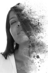 A black and white portrait of an long haired asian woman