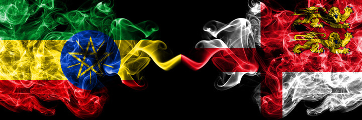 Ethiopia, Ethiopian vs United Kingdom, Great Britain, British, Sark smoky mystic flags placed side by side. Thick colored silky abstract smoke flags.