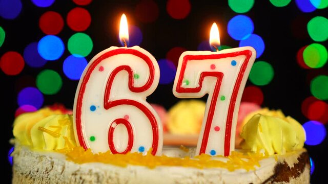 Number 67 Happy Birthday Cake Witg Burning Candles Topper.