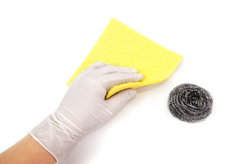 A hand in a latex glove holds a kitchen sponge for washing and cleaning isolated on white.