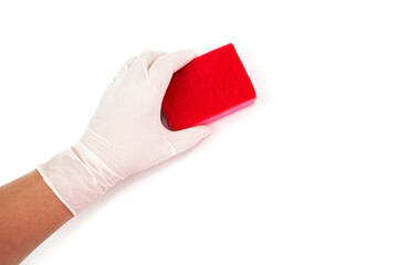 hand in glove holds kitchen sponge isolated on white