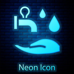 Glowing neon Wudhu icon isolated on brick wall background. Muslim man doing ablution. Vector